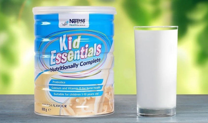 Hộp sữa Kid Essentials màu xanh lá cây với hình ảnh trái cây
